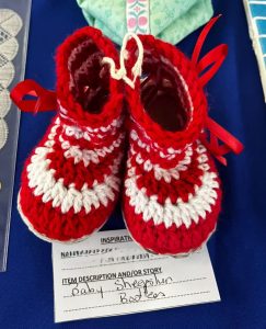 Crocheted booties with sheepskin sole