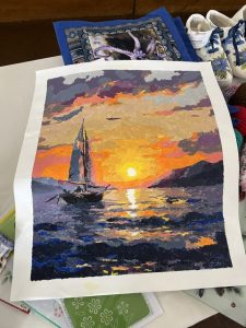 Paint by number painting of a boat at sunset