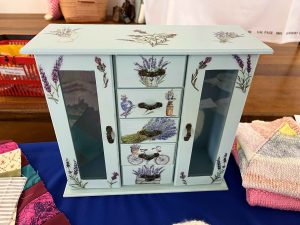 Decoupaged jewellery cabinet